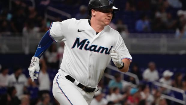 Jul 11, 2022; Miami, Florida, USA; Miami Marlins designated hitter Garrett Cooper (26) runs the bases for a double in the sixth inning against the Pittsburgh Pirates at loanDepot park. Mandatory Credit: Jasen Vinlove-USA TODAY Sports